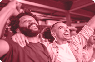 Fans celebrating at a sports event.